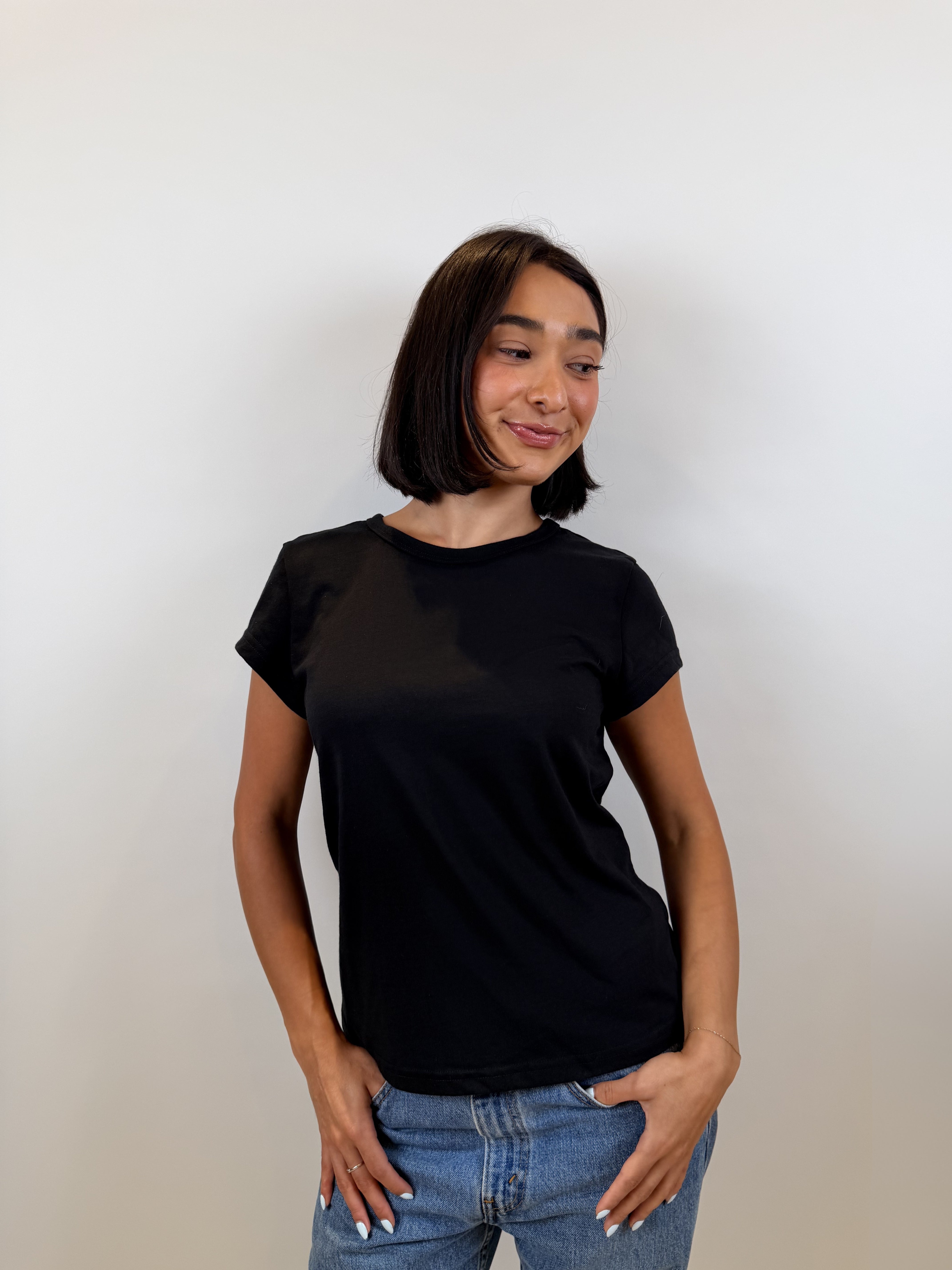 The Cap Sleeve Tee in black, front view