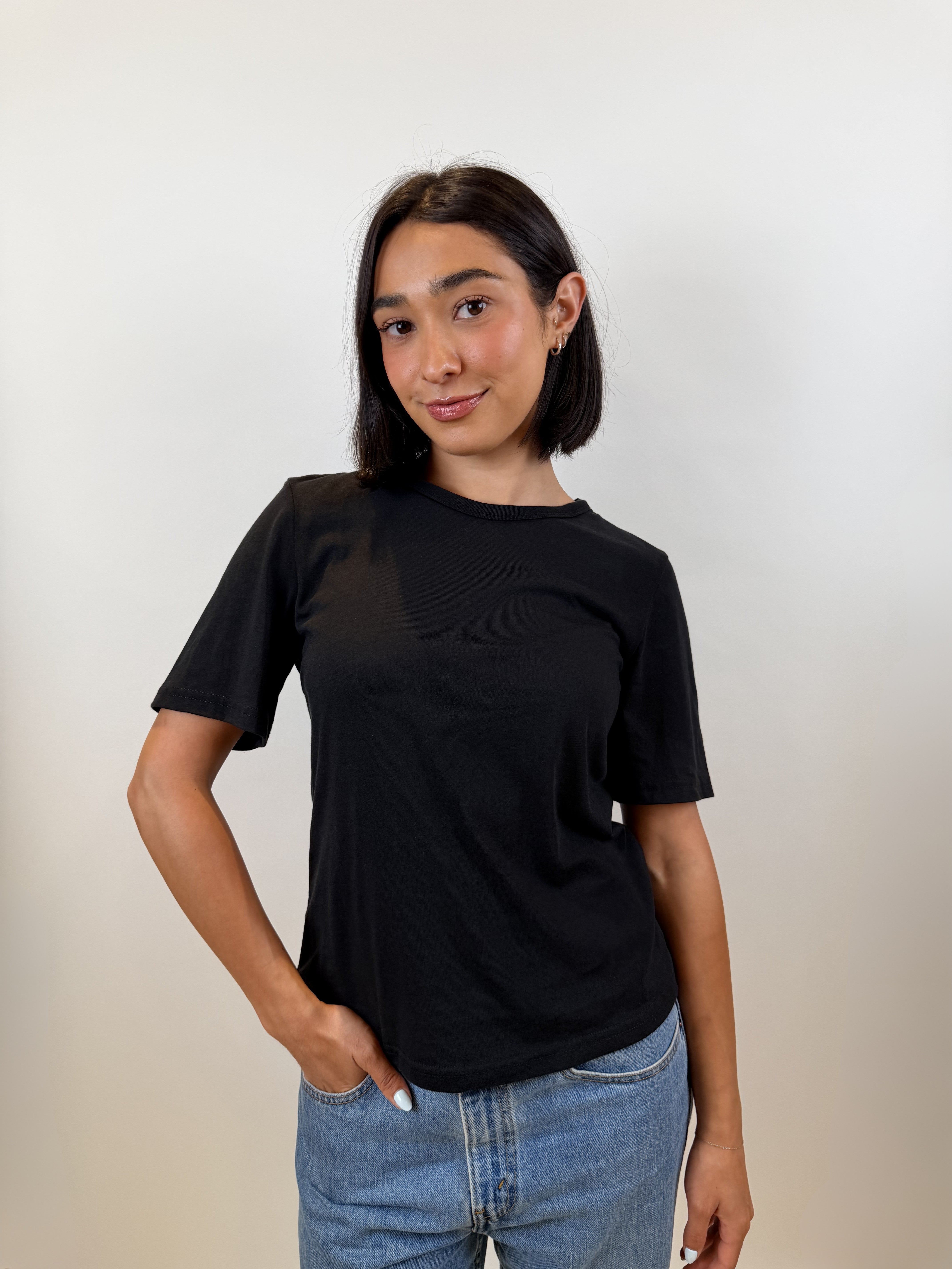 The Short Sleeve Tee in black, front view