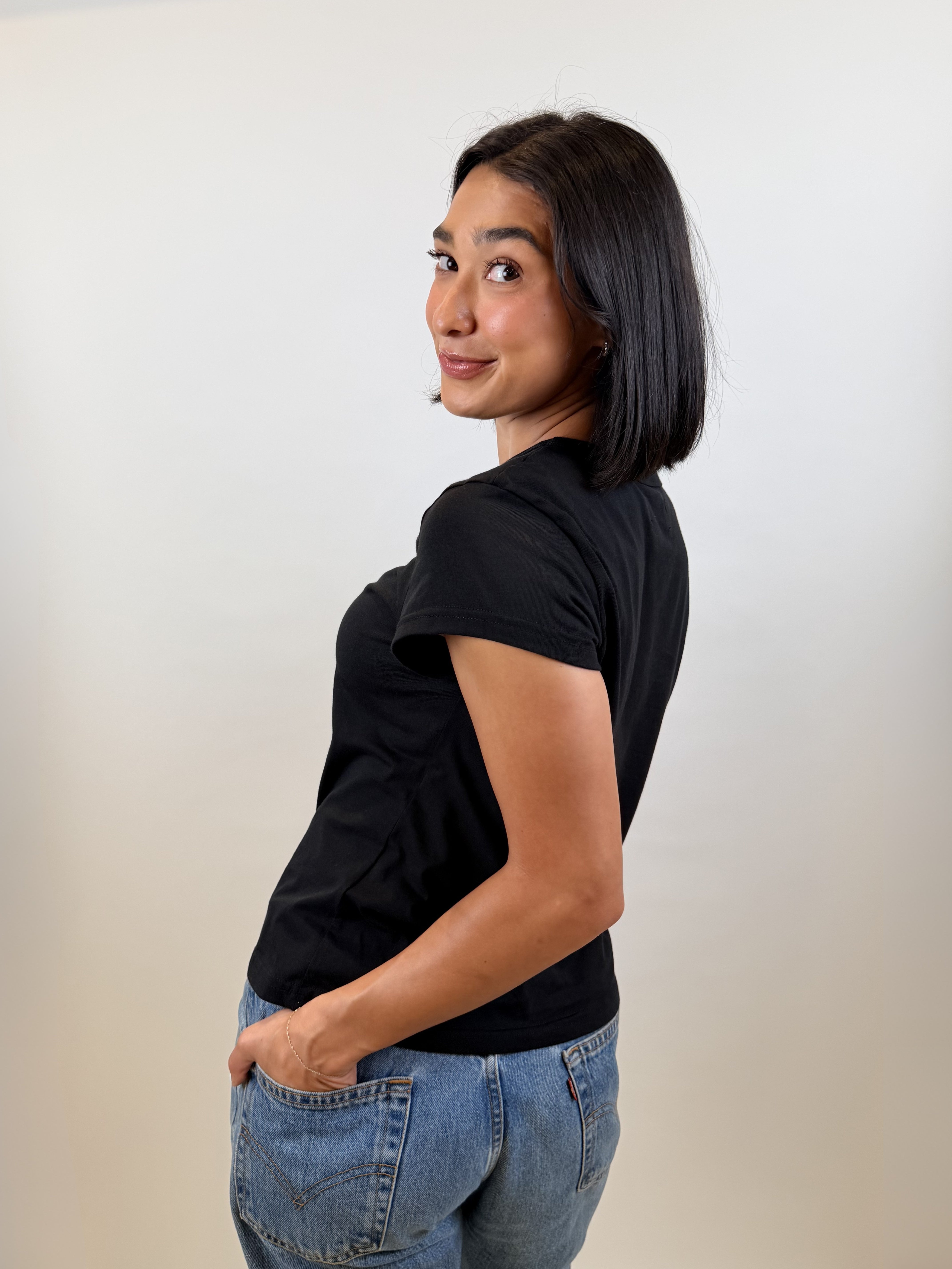 The Cap Sleeve Tee in black, side view