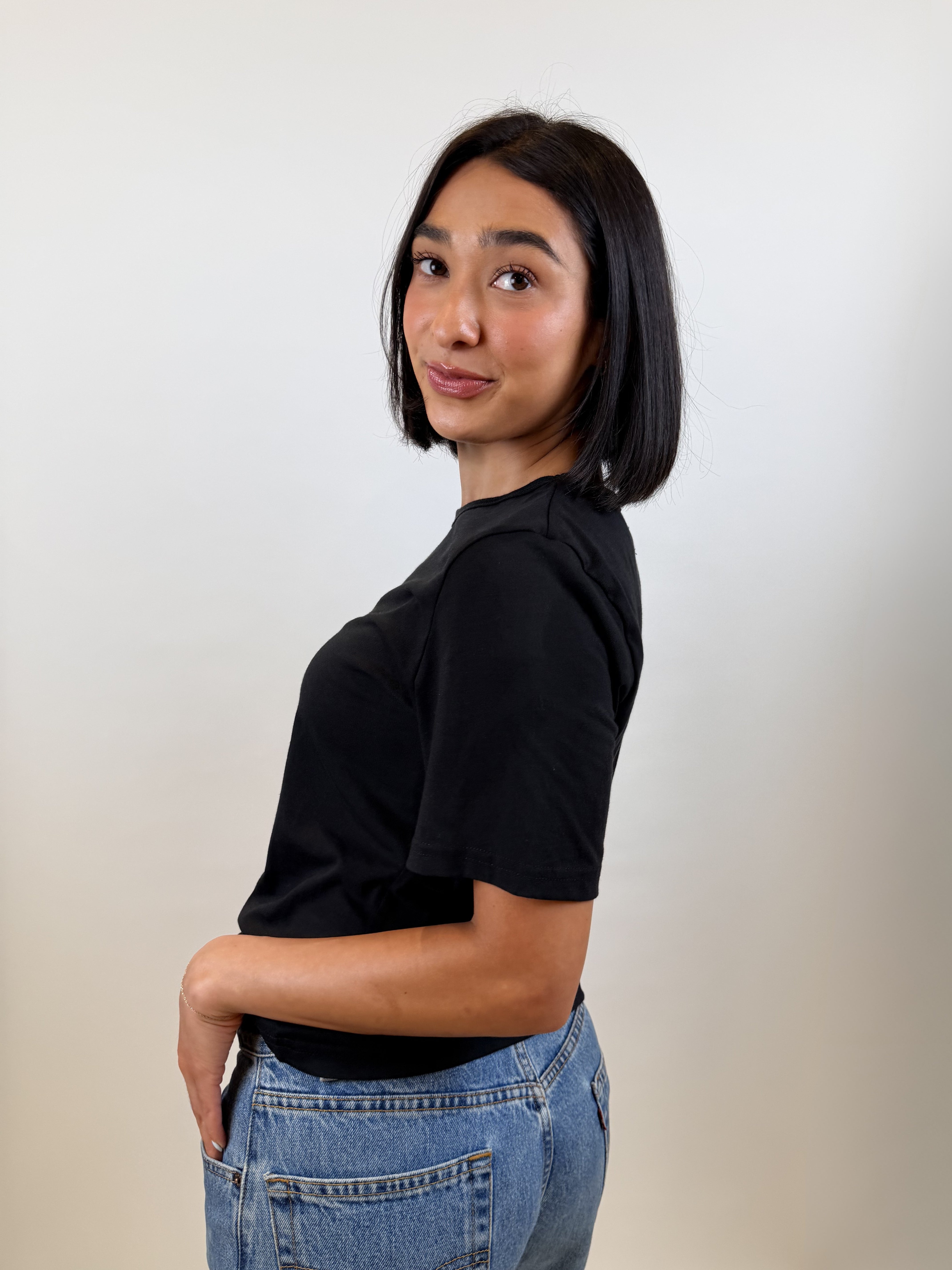 The Short Sleeve Tee in black, side view